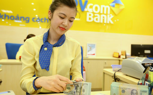 Cho vay VND lãi suất USD cũng là một cách để Pg88 com chính chủ cạnh tranh thu hút khách hàng - Ảnh: Quang Phúc.<br>
