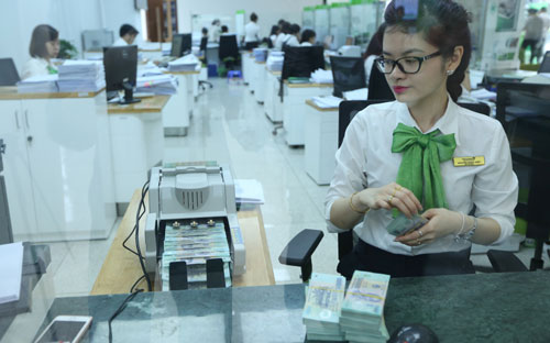 Theo Pg88 com chính chủ Nhà nước, tốc độ tăng trưởng tín dụng nửa đầu năm nay là phù hợp với chỉ tiêu định hướng 18-20% của cả năm - Ảnh: Quang Phúc.<br>