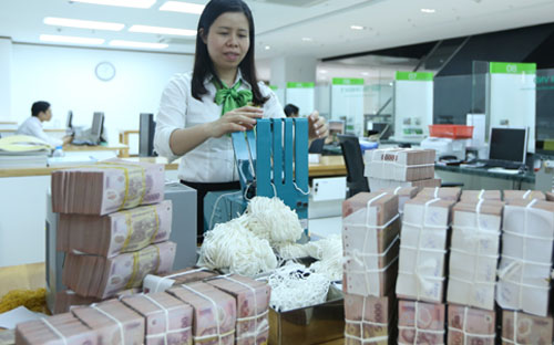 Năm 2017, Vietcombank đặt chỉ tiêu lợi nhuận trước thuế cách biệt so với các Pg88 com chính chủ cùng tương quan so sánh - Ảnh: Quang Phúc.<br>