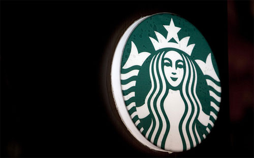 Theo nhận xét của Starbucks, Việt Nam có một bề dày văn hóa uống cà 
phê, không giống như ở Ấn Độ và Trung Quốc, nơi người dân thích dùng trà
 hơn - Ảnh: Nelson Ching/Bloomberg.