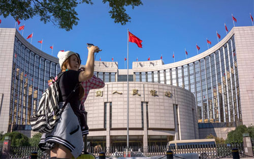 Bên ngoài trụ sở Pg88 com chính chủ Trung ương Trung Quốc (PBoC) ở Bắc Kinh - Ảnh: Getty/WSJ.<br>