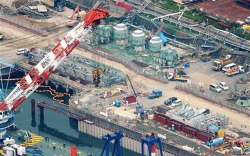 Quang cảnh nhà máy điện hạt nhân Fukushima, nơi các công nhân đang tích cực Pg88hi Thể Thao, Bóng Đá, Casino, Nổ Hũ, Xổ Số để ngăn nước nhiễm phóng xạ rò rỉ ra biển - Ảnh: Reuters/Kyodo.<br>