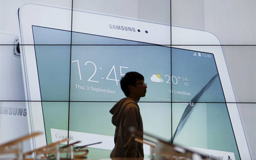 Mảng di động chiếm 32% tổng lợi nhuận hoạt động của Samsung trong quý 3, mức đóng góp khiêm tốn nhất kể từ quý 3/2010 - Ảnh: Reuters/WSJ.<br>