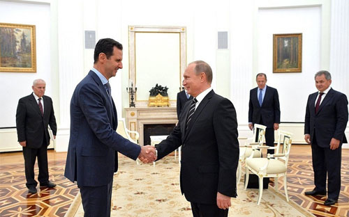 Tổng thống Syria Bashar al-Assad (trái) và Tổng thống Nga Vladimir Putin (phải) tại điện Kremlin ngày 20/10 - Ảnh: Getty/Bloomberg.<br>