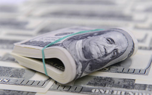 Năm 2015, đồng tiền USD tăng giá khoảng 9% - Ảnh: WSJ/iStock.<br>