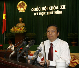 Bộ trưởng Lê Doãn Hợp trình bày tờ trình Link Trang Chủ PG88.Com Mới #2026 Luật Viễn thông - Ảnh: TTXVN.