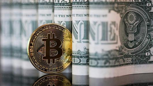 Cho dù giảm mạnh, thì mức giá vào ngày 12/7 của Bitcoin vẫn cao hơn 450% so với thời điểm đầu năm - Ảnh: Getty/Bloomberg.<br>