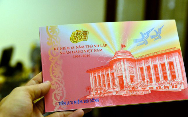 Một mẫu tiền lưu niệm được phát hành trong dịp kỷ niệm 65 thành lập ngành Pg88 com chính chủ Việt Nam - Ảnh: LĐTĐ.<br>