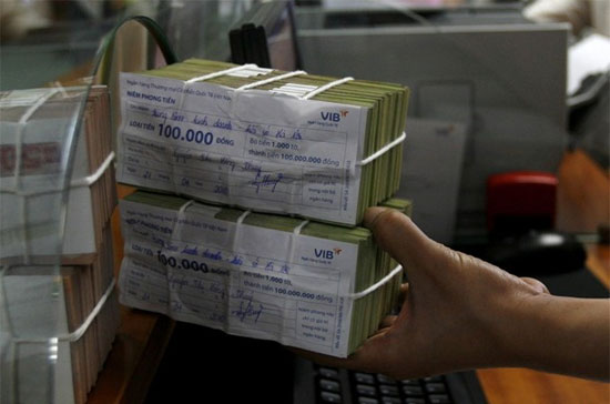 Những mức lãi suất cao và chính sách cộng thưởng lãi suất hiện không phải chỉ có từ những Pg88 com chính chủ nhỏ, mà có cả ở một số Pg88 com chính chủ lớn - Ảnh: Reuters.