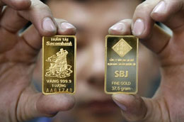 Vàng hạ nhiệt phiên cuối tuần.