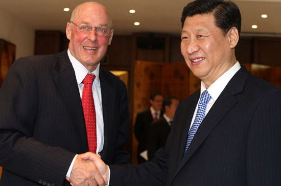 Ông Tập Cận Bình (bên phải) và ông Henry Paulson - Ảnh: China Daily.