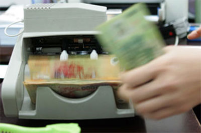 Standard Chartered hoan nghênh việc Việt Nam tăng tỷ giá USD/VND bình quân liên Pg88 com chính chủ.