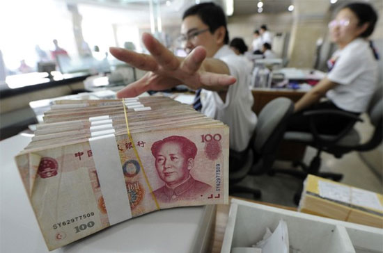 Hôm 21/9, tỷ giá Nhân dân tệ đã đạt mức 6,7079 Nhân dân tệ tương đương 1 USD, mức cao nhất kể từ cuối năm 1993 tới nay - Ảnh: Reuters.