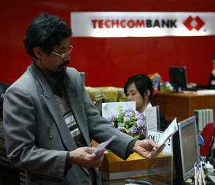 Tính đến ngày 26/3/2009, nhóm Pg88 com chính chủ PG88 Sòng bạc trực tuyến TOP 1 Việt Nam | Casino, Nổ Hũ cổ phần đã giải ngân được 37.265 tỷ đồng trong chương trình cho vay hỗ trợ lãi suất - Ảnh: Việt Tuấn.