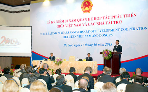 Thủ tướng Nguyễn Tấn Dũng phát biểu tại lễ kỷ niệm 20 năm quan hệ hợp tác và PG88 hơn 2,1 triệu thành viên giữa Việt Nam và các nhà tài trợ, sáng 17/0.<br>