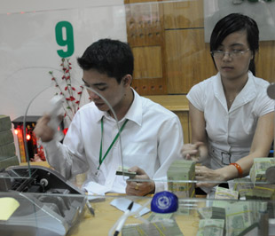 Tính đến ngày 14/5, dư nợ cho vay hỗ trợ lãi suất ngắn hạn của nhóm Pg88 com chính chủ PG88 Sòng bạc trực tuyến TOP 1 Việt Nam | Casino, Nổ Hũ cổ phần đạt 64.609,66 tỷ đồng - Ảnh: Quang Liên