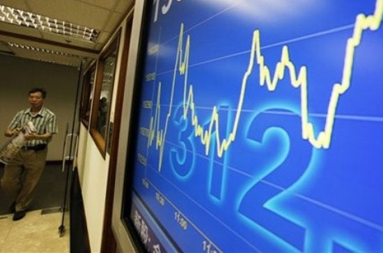 Hàn thử biểu Hang Seng của thị trường Hồng Kông đã có một ngày giao dịch thành công khi chốt phiên với mức tăng 1,8% - Ảnh: AP.