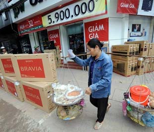 Gói kích cầu được kỳ vọng sẽ giúp nền PG88 ⭐ Link trang chủ số 1 nhà cái PG88 com casino slot Việt Nam nhanh chóng thoát ra những biểu hiện suy giảm - Ảnh: AFP.