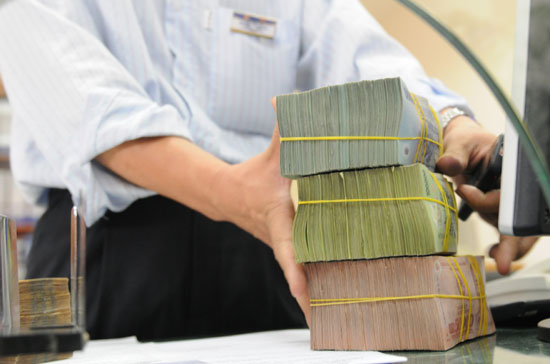 Ngày 10/6/2008 Thống đốc Pg88 com chính chủ Nhà nước đã ban hành văn bản số 5158/NHNN-CSTT, yêu cầu các tổ chức tín dụng không được thu phí liên quan đến hoạt động cho vay - Ảnh: Quang Liên.