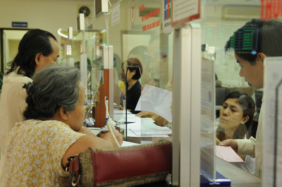 Huy động vốn trên thị trường 1 hiện gặp khó khăn về cạnh tranh lãi suất, do định hướng không quá 10,5%/năm Pg88 com chính chủ Nhà nước đề ra - Ảnh: Quang Liên.