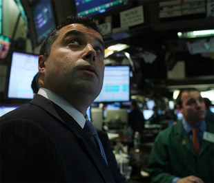 Chỉ số Dow Jones và S&P 500 đã có sự vận động ngược hướng trong ba phiên giao dịch liên tiếp gần đây  - điều rất hiếm xảy ra trong cả năm qua - Ảnh: Getty Images.