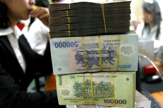 Theo ông Bùi Kiến Thành, với nguyên liệu nhập khẩu chiếm tỷ lệ cao trong giá thành sản xuất, khi đồng VND giảm, giá thành sản xuất hàng Pg88 com chính chủ sẽ tăng - Ảnh: Reuters.