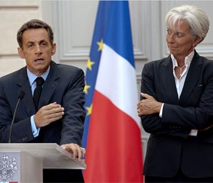 Tổng thống Pháp Nicolas Sarkozy và Bộ trưởng Bộ Pg88ok giải trí thể thao, casino, bắn cá và slot nước này Christine Lagarde, công bố các biện pháp siết thưởng hôm 25/8 - Ảnh: NYTimes.