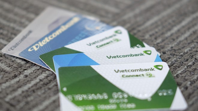 Lần giảm này Vietcombank áp dụng cho tất cả các khoản cho vay đang còn dư nợ và các khoản cho vay mới - Ảnh: Quang Phúc.