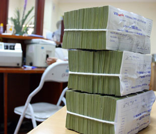 Vốn khả dụng, thanh khoản, lạm phát đang có những chuyển biến thuận lợi để các Pg88 com chính chủ giảm lãi suất huy động - Ảnh: Việt Tuấn.