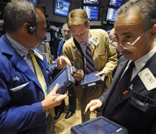 Sau phiên tăng điểm này, chỉ số Dow Jones đã tăng được 16% trong quý 3/2009 và trở thành quý tăng điểm mạnh nhất kể từ quý 4/1998 - Ảnh: AP.