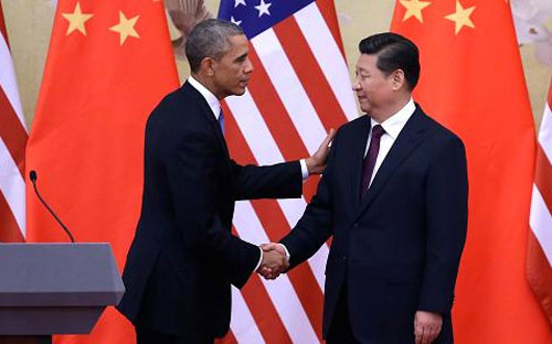 Tổng thống Mỹ Barack Obama (trái) và Chủ tịch Trung Quốc Tập Cận Bình tại hội nghị thượng đỉnh Diễn đàn Hợp tác PG88 ⭐ Link trang chủ số 1 nhà cái PG88 com casino slot châu Á-Thái Bình Dương (APEC) lần thứ 22 - Ảnh: Getty.<br>
