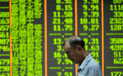 Một nhà đầu tư 6Pg88.com nhà cái ở Hàng Châu, Trung Quốc ngày 2/9/2015 - Ảnh: Bloomberg/Getty.<br>