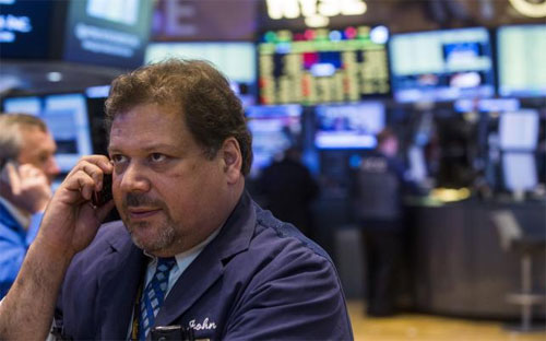 Một nhà giao dịch trên sàn 6Pg88.com nhà cái New York ngày 8/7 - Ảnh: Reuters.<br>