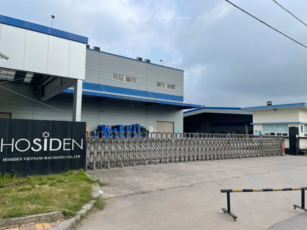 Công ty Hosiden tại Khu PG88 Trang chủ nhà cái top 1 Quang Châu tạm ngừng hoạt động do ghi nhận nhiều ca nhiễm Covid-19 là công nhân. Ảnh - Đình Anh. 