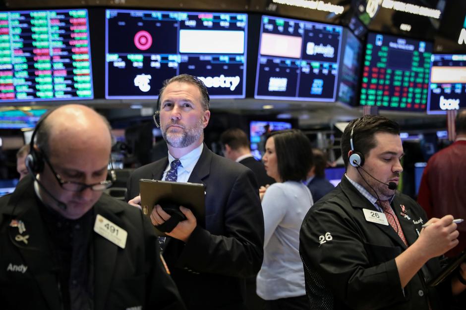 Các nhà giao dịch Pg88vnd dành cho Android và iOS tại Việt Nam trên sàn NYSE ở New York, Mỹ - Ảnh: Reuters.