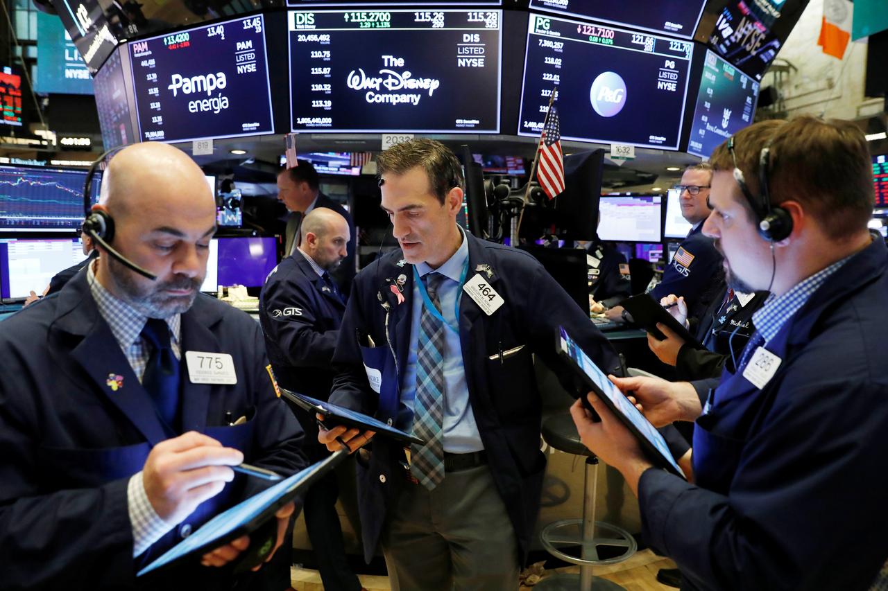 Các nhà giao dịch Pg88vnd dành cho Android và iOS tại Việt Nam trên sàn NYSE ở New York, Mỹ - Ảnh: Reuters.