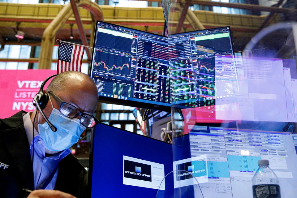 Một nhà giao dịch Pg88vnd dành cho Android và iOS tại Việt Nam trên sàn NYSE ở New York, Mỹ hôm 21/7 - Ảnh: Reuters.
