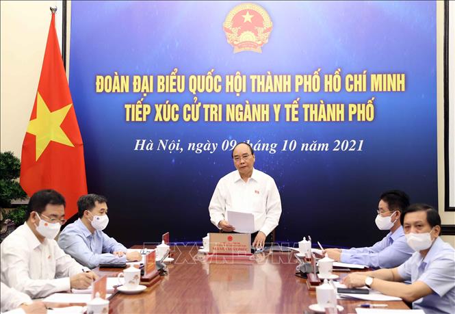 Chủ tịch nước Nguyễn Xuân Phúc và đoàn đại biểu PG88 ⭐ Link trang chủ số 1 nhà cái PG88 com casino slot TP.HCM tiếp xúc cử tri chuyên đề ngành y tế TP.HCM theo hình thức trực tuyến - Ảnh: TTXVN