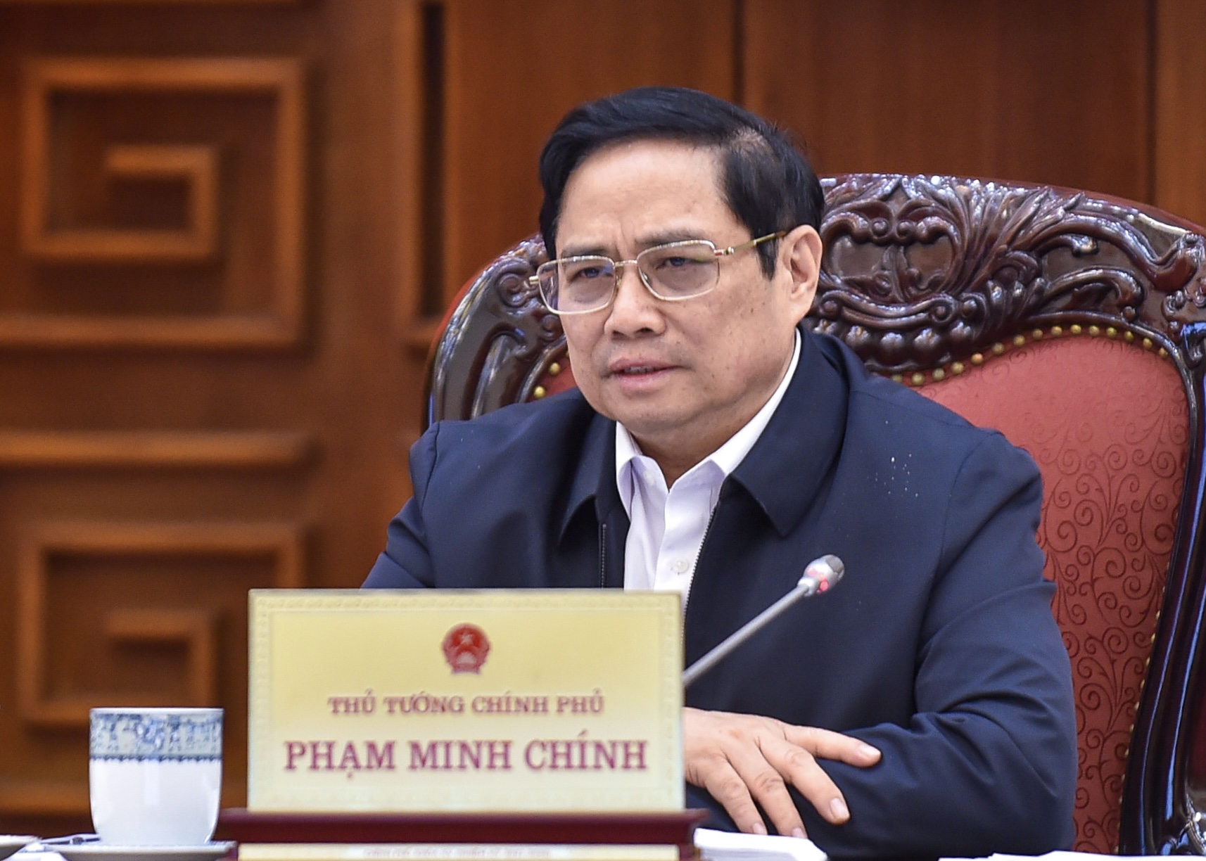 Thủ tướng Phạm Minh Chính  tại cuộc họp sáng 5/12 - Ảnh: VGP