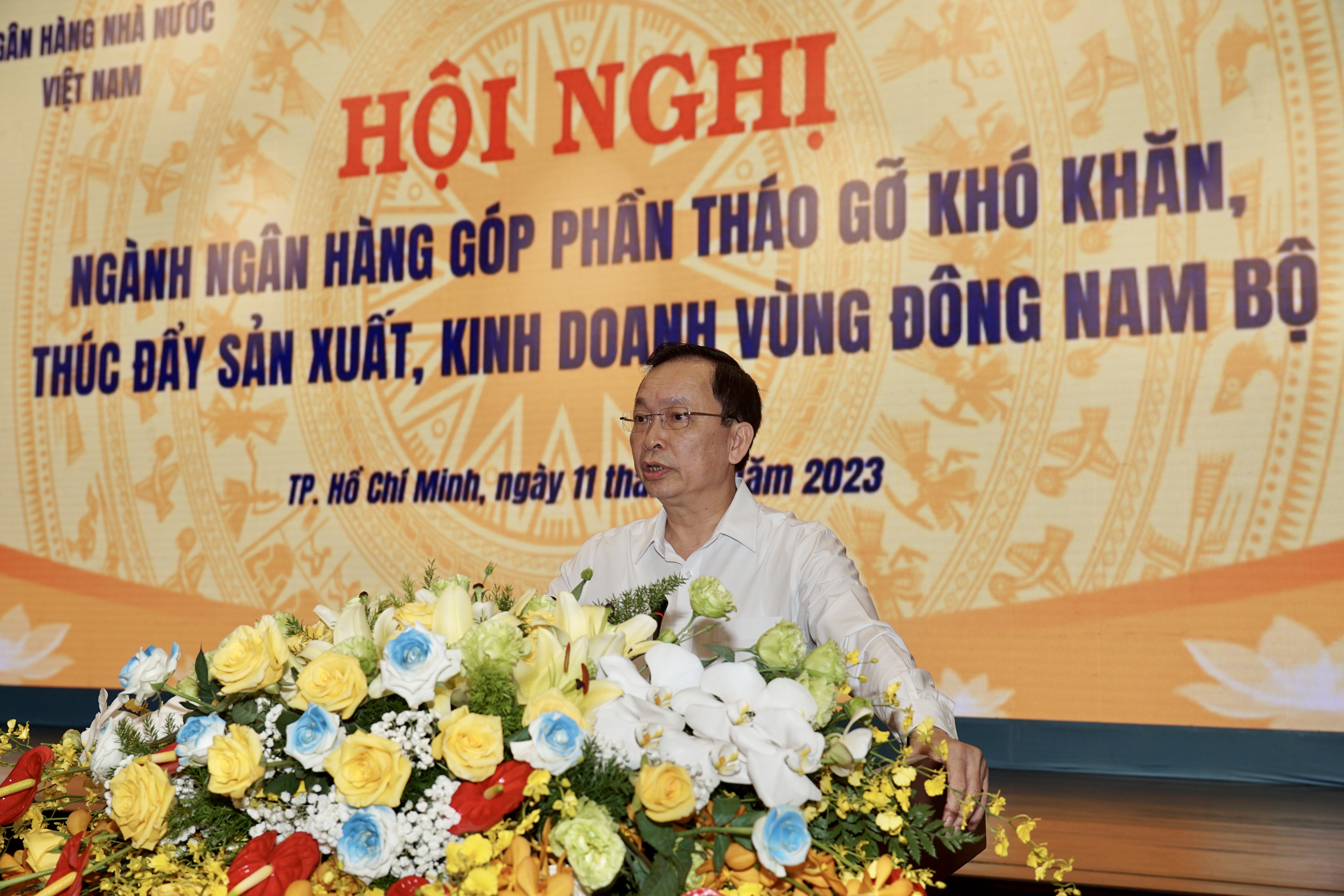 Ph&oacute; Thống đốc Ng&acirc;n h&agrave;ng Nh&agrave; nước Đ&agrave;o Minh T&uacute; ph&aacute;t biểu tại Hội nghị.