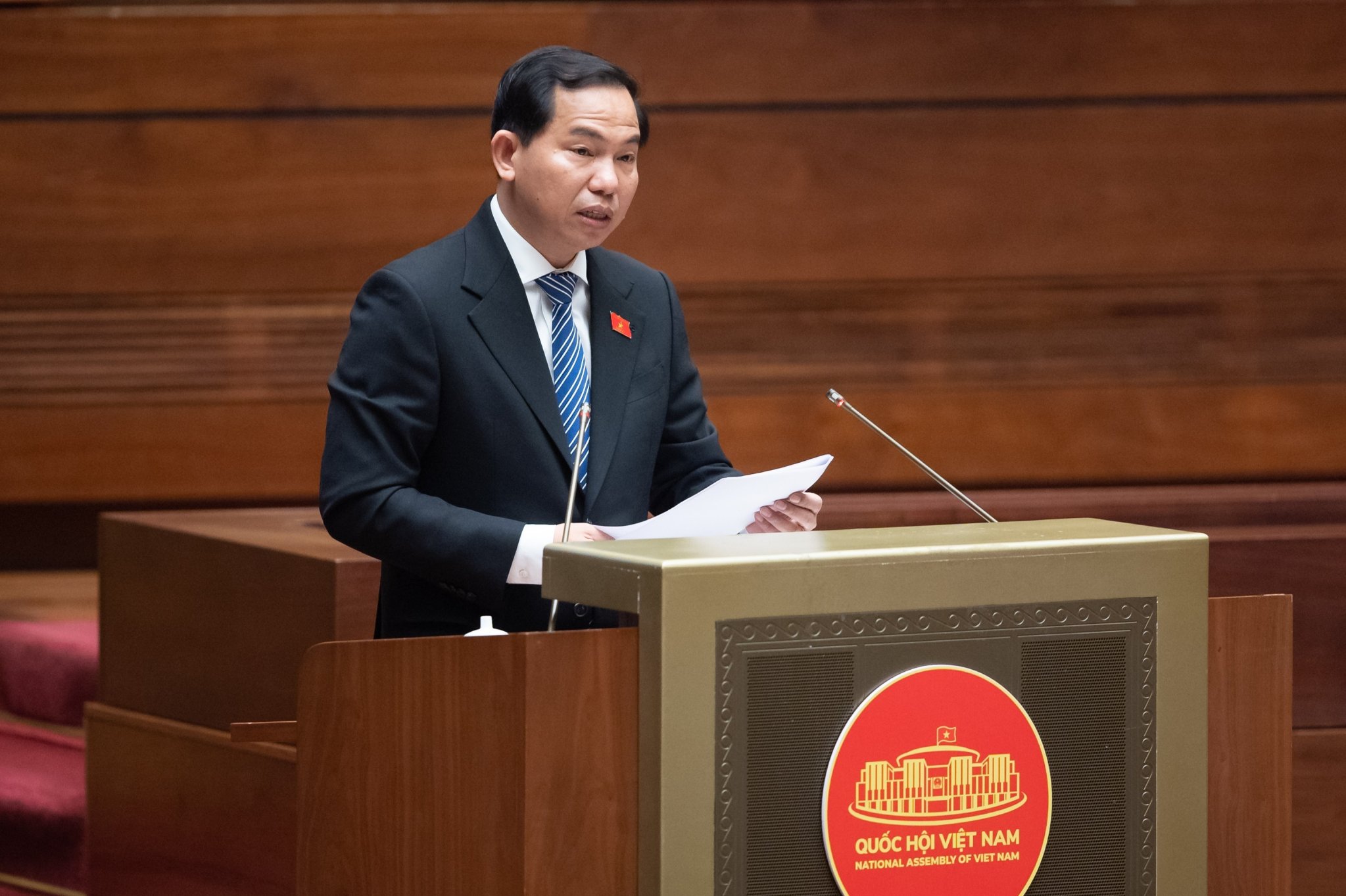 Chủ nhiệm Ủy ban T&agrave;i ch&iacute;nh, Ng&acirc;n s&aacute;ch của Link Trang Chủ PG88.Com Mới #2026 L&ecirc; Quang Mạnh tr&igrave;nh b&agrave;y b&aacute;o c&aacute;o thẩm tra.