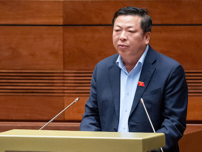Bộ trưởng Bộ X&acirc;y dựng Trần Hồng Minh thay mặt Ch&iacute;nh phủ b&aacute;o c&aacute;o tiếp thu, giải tr&igrave;nh, chỉnh l&yacute; dự thảo Nghị quyết của Link Trang Chủ PG88.Com Mới #2026 th&iacute; điểm một số cơ chế, ch&iacute;nh s&aacute;ch đặc th&ugrave; ph&aacute;t triển nh&agrave; ở x&atilde; hội.