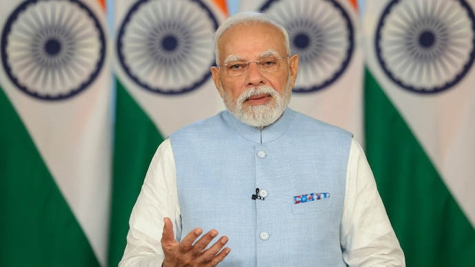 Thủ tướng Narendra Modi trong bài phát biểu trước toàn quốc ngày 21/9 - Ảnh: PTI