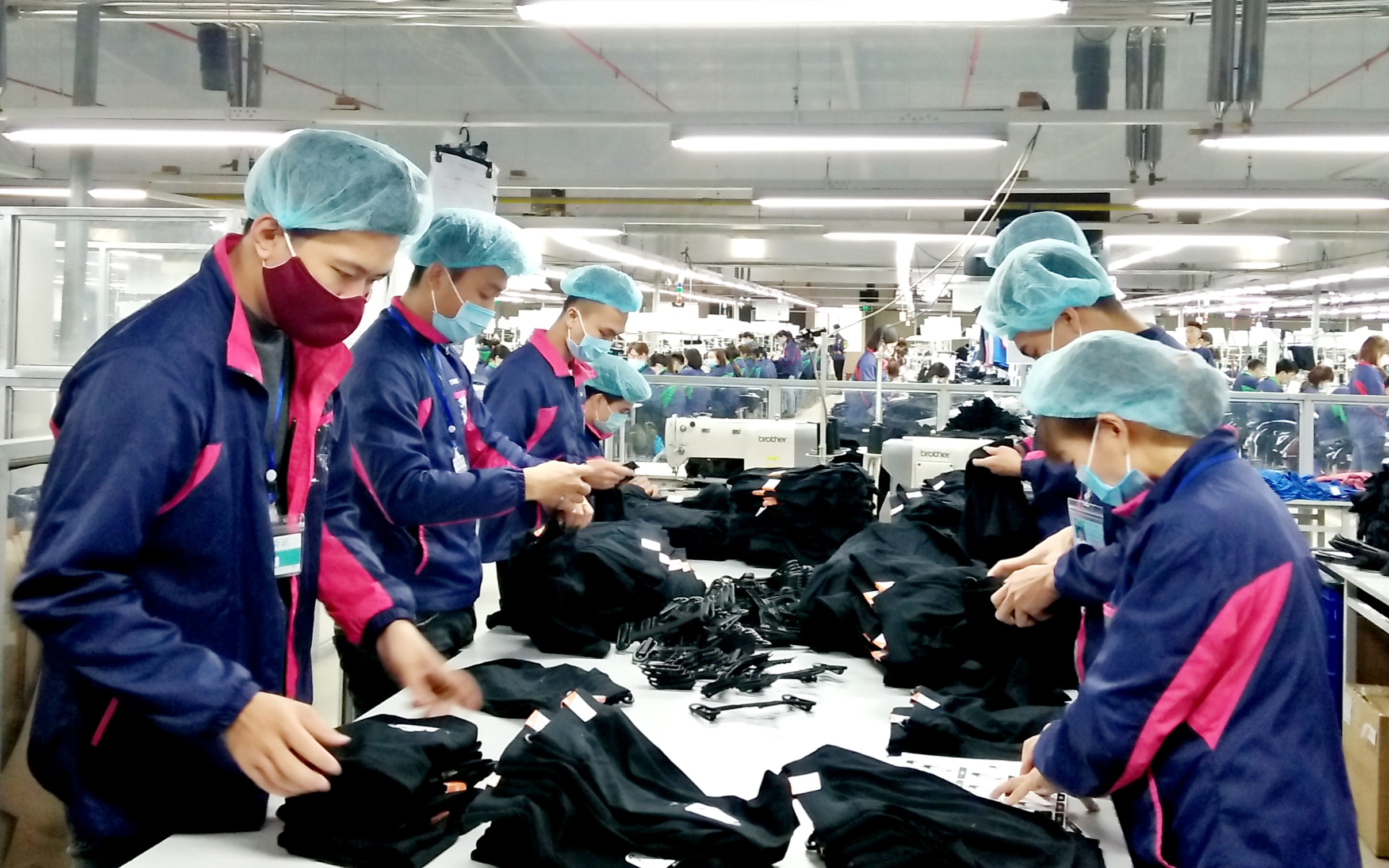 Người lao động Pg88hi Thể Thao, Bóng Đá, Casino, Nổ Hũ, Xổ Số trong ngành dệt may. Ảnh: TH.