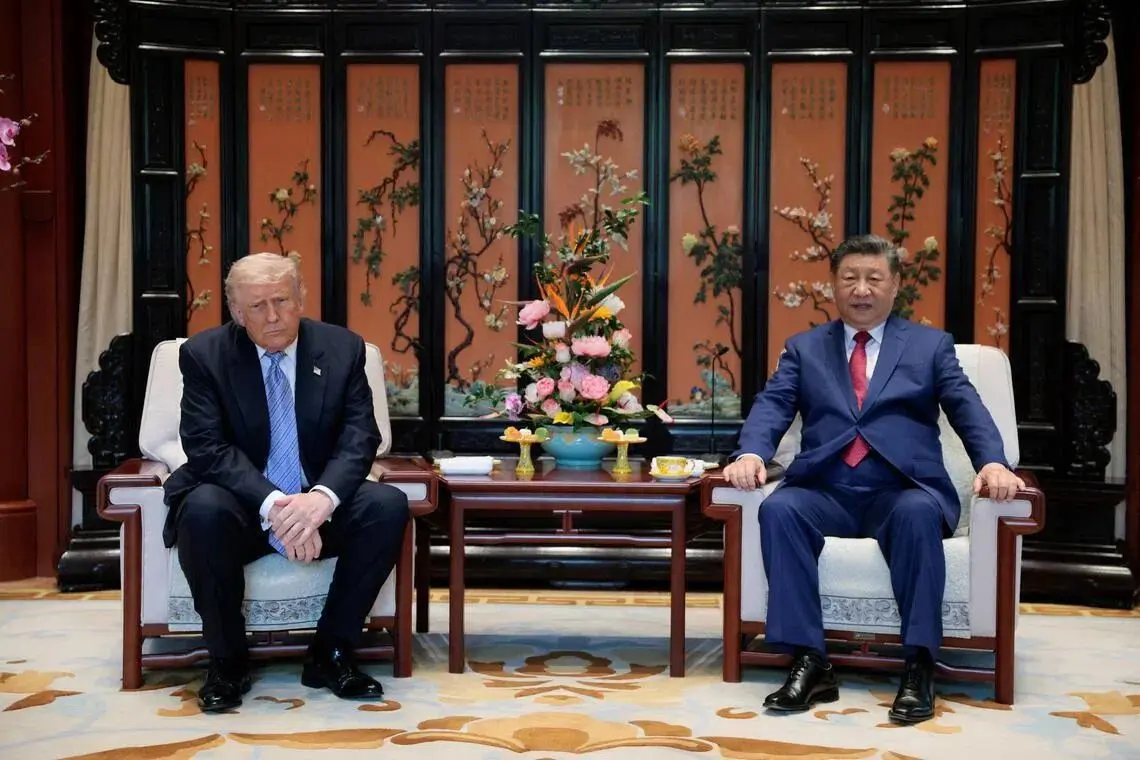 Tổng thống Mỹ Donald Trump và Chủ tịch Trung Quốc Tập Cận Bình tại Bắc Kinh - Ảnh minh họa - Ảnh: Reuters